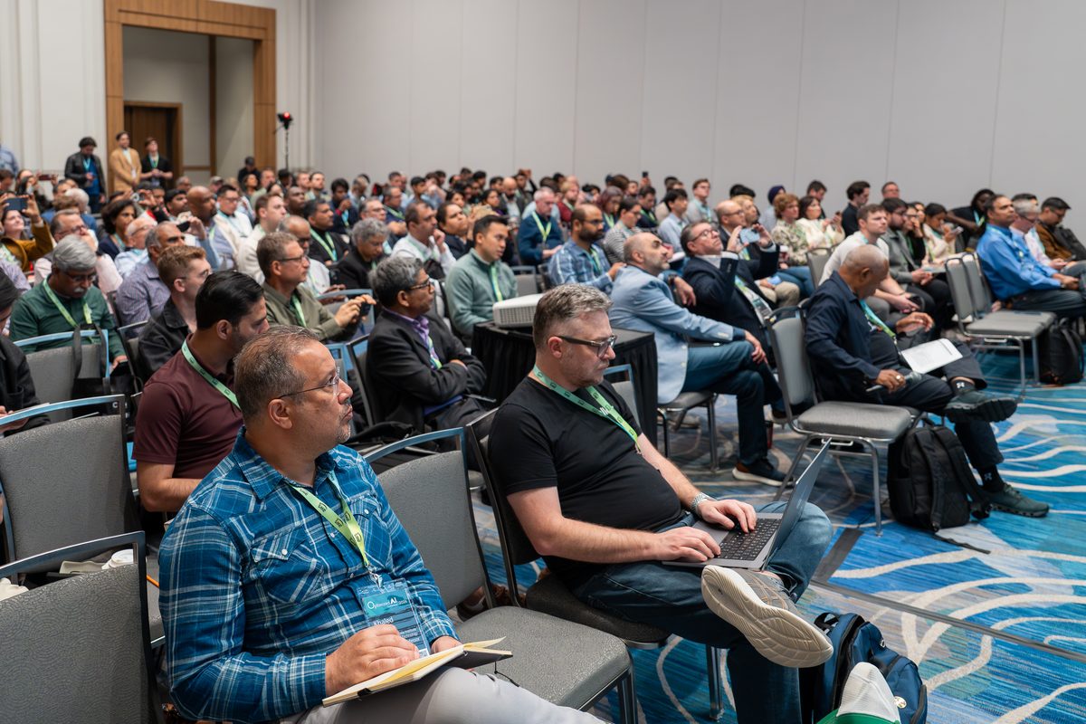 Attendees listening closely in a breakout session at OAI 2026
