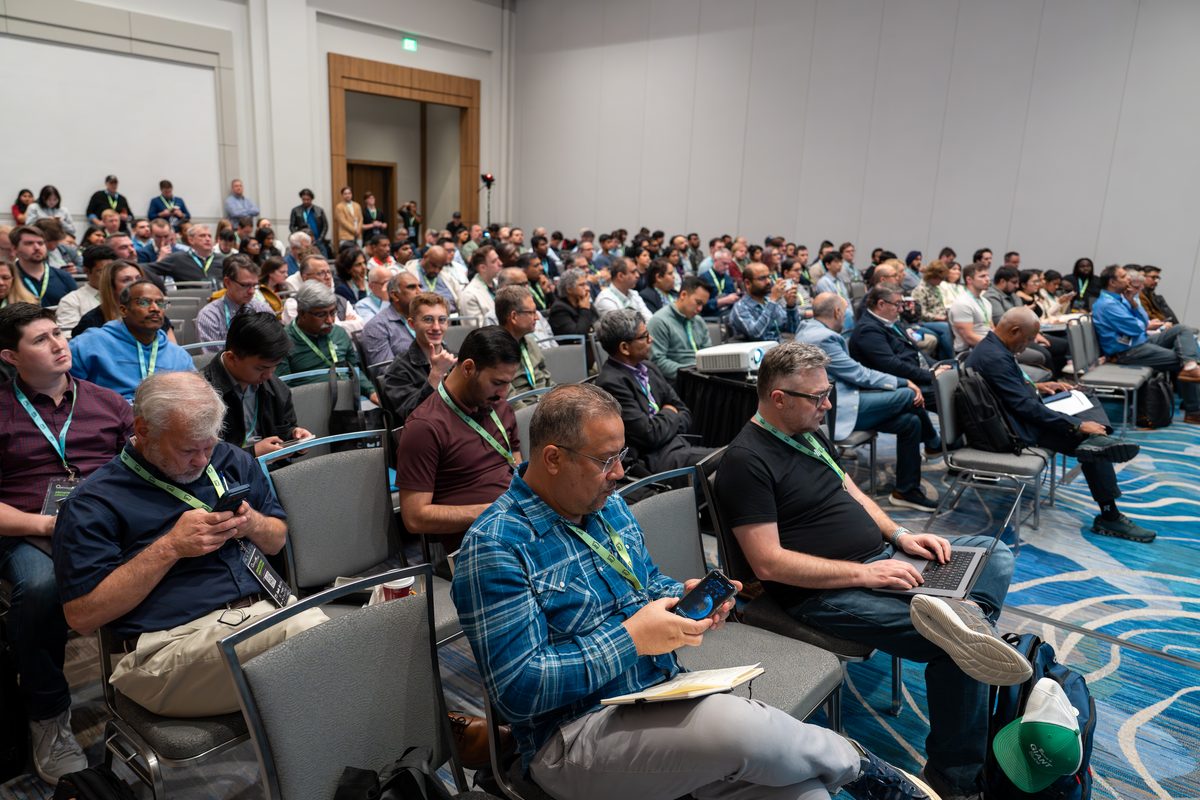 Attendees seated close to the stage in a breakout session at OAI 2026